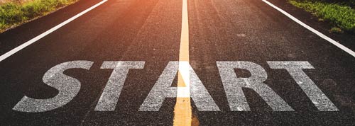 Two-lane road with the word START across both lanes