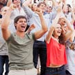 Cheering crowd of adults.