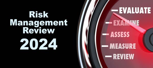 Risk Management Review image of a gauge with a needle pointing to Evaluate.