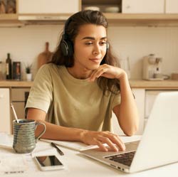 Woman on laptop.