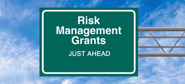 Green highway saying with the words Risk Management Grants Just Ahead.