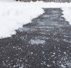 Snow-cleared sidewalk.